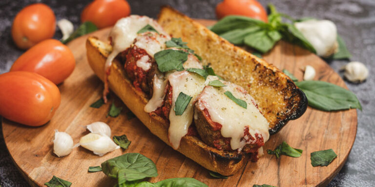 Best Louisville Pizza - Meatball Sub - House Made Meatballs with Tomato Sauce. Fresh Mozzarella, Parmesan Cheese, and Roasted Garlic Aioli